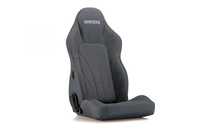 BRIDE racing car seat in dark gray fabric, bucket-style with side bolsters and molded shaping.