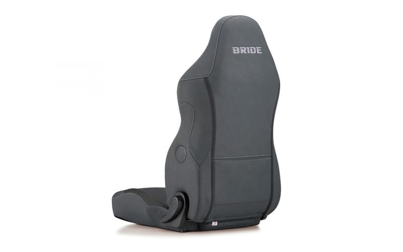 Black racing-style bucket car seat with BRIDE logo, shown from a side/back angle.
