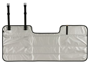 Beige padded car seat protector with black edges and two vertical buckle straps for headrest mounting.