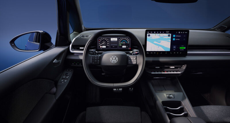 Modern car interior with a digital instrument cluster and a touchscreen navigation display mounted on the dashboard