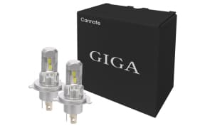 Pair of GIGA LED automotive headlight bulbs with metal bases beside a black GIGA box.