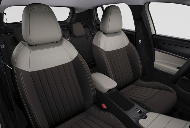 Front seats in a modern car with beige headrests and dark brown outer panels, center console between them.