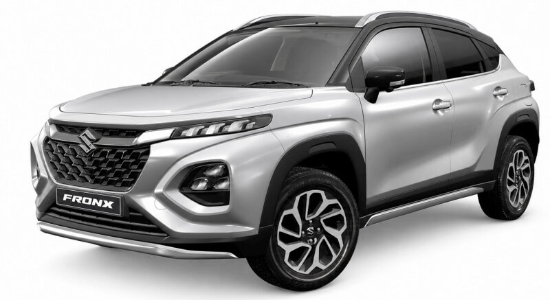 Silver Suzuki Fronx SUV shown in a front-left three-quarter view with black roof rails and alloy wheels.