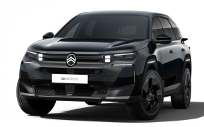 Front three-quarter view of a black SUV with a prominent grille, isolated on a white background.