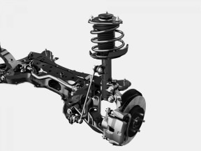 Front suspension system assembly with coil spring and wheel attached, isolated on white background