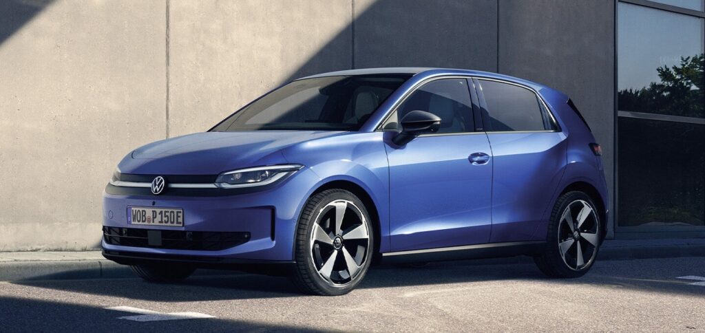 Blue Volkswagen hatchback parked beside a concrete building, shown in a three-quarters side view.