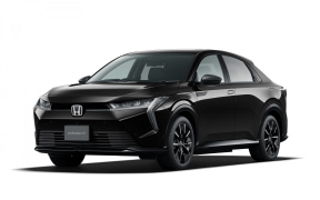 Black Honda sedan shown in a three-quarter front view, highlighting its sleek design and glossy finish.
